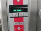 a close up of a machine with buttons on the side of it