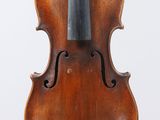 an old violin with a bow on a white background