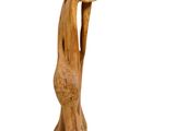 wooden sculpture of a giraffe with a long neck and long legs