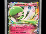 a close up of a pokemon card in a plastic case
