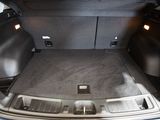 a trunk of a car with the back seats folded down