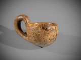 an image of a cup with a handle on a table