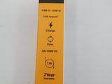 a close up of a yellow box with a black stripe on it
