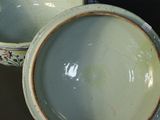 two bowls sitting next to each other on a table