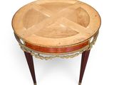 an image of a round table with a wooden top