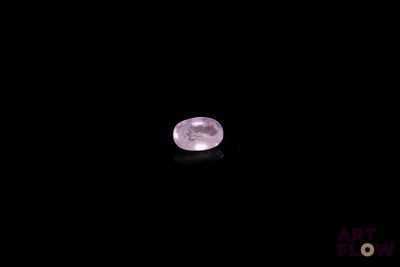 a close up of a pink moon in the dark sky