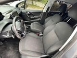 the interior of a car with a steering wheel and a dashboard