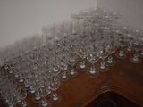a lot of empty wine glasses on the table