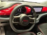 a picture of the interior of a car with a steering wheel and dashboard