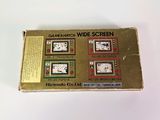 the box is open on a white surface with a picture on it