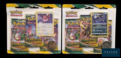two packs of pokemon trading cards on a black background