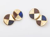 a pair of gold and lapis stone cufflinks