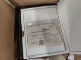 a picture of a box with a lot of papers inside of it
