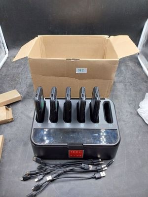 a bunch of knives in a box on a table