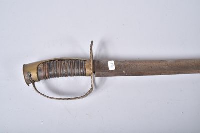 a picture of a very old looking sword on a white surface