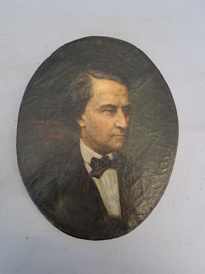 tableau représentant un homme en smoking, vêtu d'un costume noir et d'un nœud papillon
