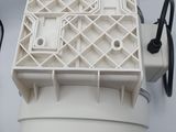 a white box that has a bunch of wires attached to it