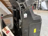 a machine that is sitting in a garage