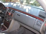 a dashboard of a car with a steering wheel in it