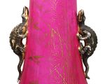 a pink vase with a gold design on it
