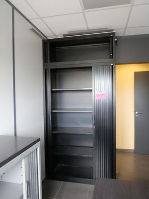 an image of a kitchen with a pantry in the corner