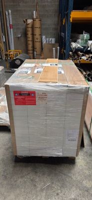 a large box sitting on top of a pallet in a warehouse