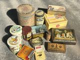 many different types of tins sitting on the ground