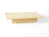 a close up of a square table with a white surface