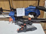 a blue and black machine that is on a table