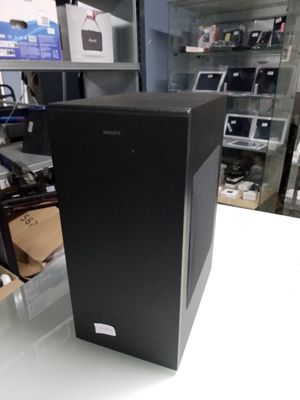a black box sitting on top of a white table