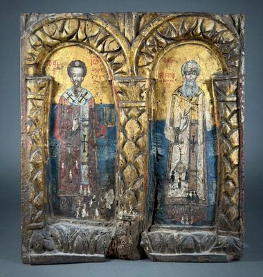 an image of a pair of wooden plaques with religious figures on them