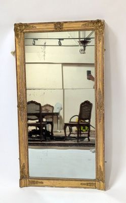 a mirror that is hanging on the wall