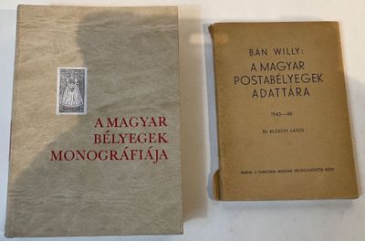 two books sitting on a table next to each other
