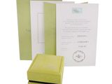 a yellow box with a note inside of it