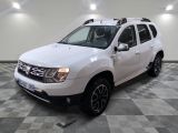 a picture of a white dacia suv parked in a garage