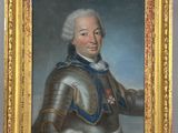 portrait of a man in armor in a gold frame