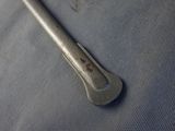 a wrenet that is laying on a piece of cloth