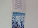 a stamp with a picture of a mountain on it