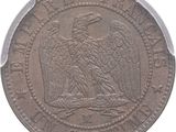 an old coin with an eagle on it on a white background