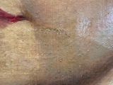 close up of a painting of a woman ' s face with red lips