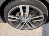 a close up of a tire on a car ' s rim