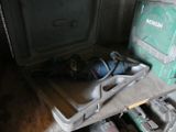 a metal tray with a tool on top of it