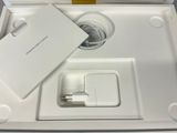 a white box with a charger and a charger in it