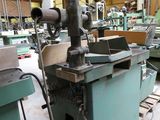 a machine that is sitting in a room with other machines