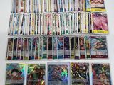 a large collection of pokemon cards are on a table