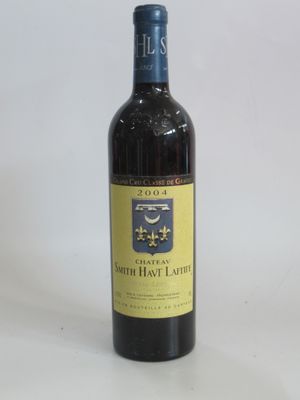 a bottle of wine that is sitting on a table