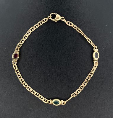 Bracelet en or jaune 750 millièmes à maille marine serti d'une émeraud - Photo 1