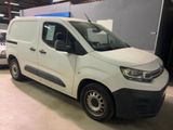 a white van that is parked in a garage