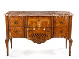 un buffet à tiroirs avec un plateau en marbre et un motif en damier