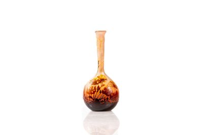 a vase that is sitting on a white surface